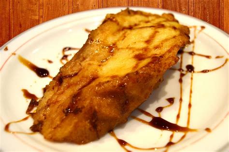 baked-bananas-dessert-with-orange-sauce image