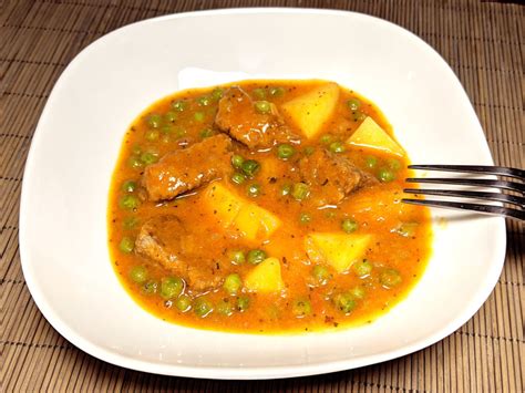 veal-stew-with-potatoes-and-peas-spezzatino-con image