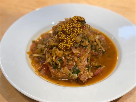 pork-chops-with-beer-sauerkraut-food-network image