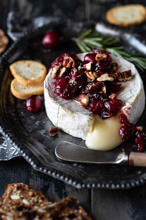 easy-baked-brie-with-jam-no-pastry-garnish-with-lemon image