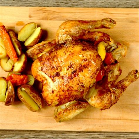 whole-chicken-stuffed-with-onion-and-lemon-so image