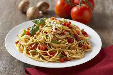 fresh-tomato-pasta-with-basil-recipe-the-spruce-eats image