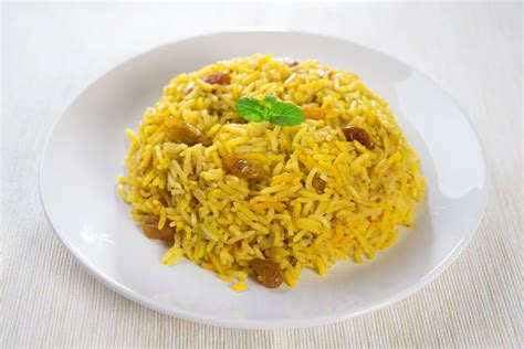 curried-rice-with-raisins-recipe-the-spruce-eats image