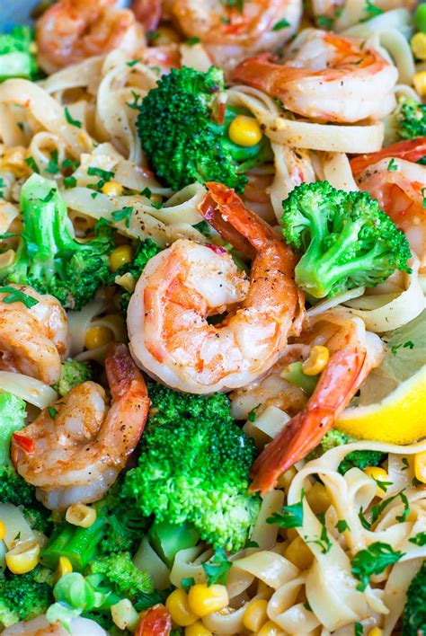 cajun-shrimp-pasta-with-lemon-and-veggies-peas-and image