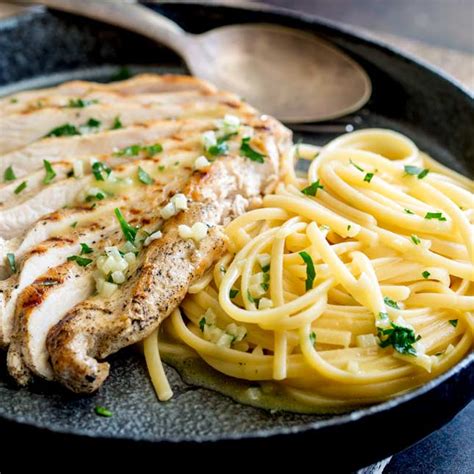 garlic-butter-pasta-with-garlic-chicken-sprinkles-and-sprouts image