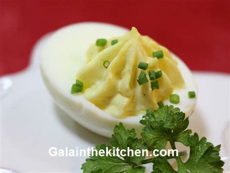 russian-stuffed-eggs-recipe-with-garnish-ideas-gala image