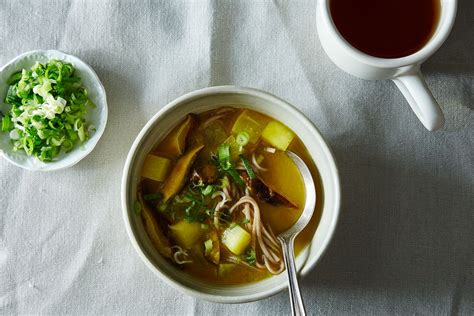 turmeric-miso-soup-with-shiitakes-turnips-and-soba image