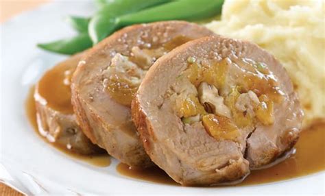 pork-tenderloin-stuffed-with-walnuts-apricots-and-maple image
