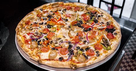 what-toppings-come-on-a-supreme-pizza-the-sauce image