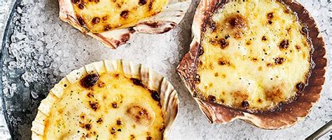 baked-scallops-in-shell-recipe-with-cheese image