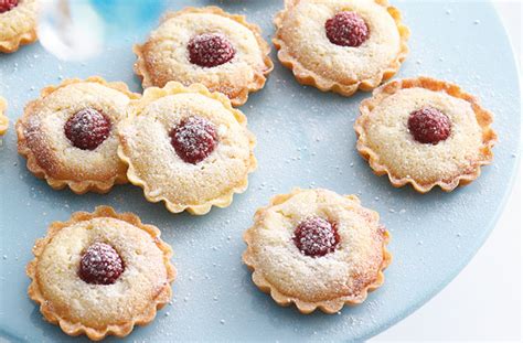 mini-raspberry-and-frangipane-tarts-british image