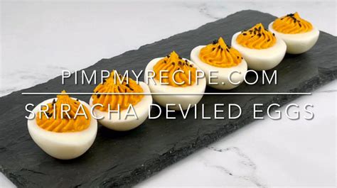 sriracha-deviled-eggs-deliciously-spicy image