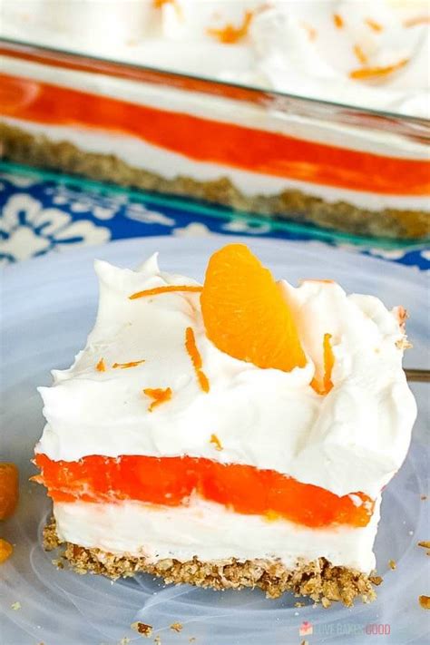orange-gelatin-pretzel-salad-love-bakes-good-cakes image