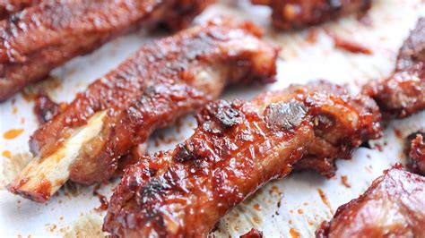 spicy-oven-baked-pork-spare-ribs-recipe-tasting-table image