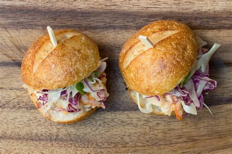 salmon-burger-with-red-cabbage-fennel-slaw image