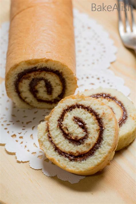 swiss-roll-cake-recipe-nutella-roulade-recipe-bakealish image