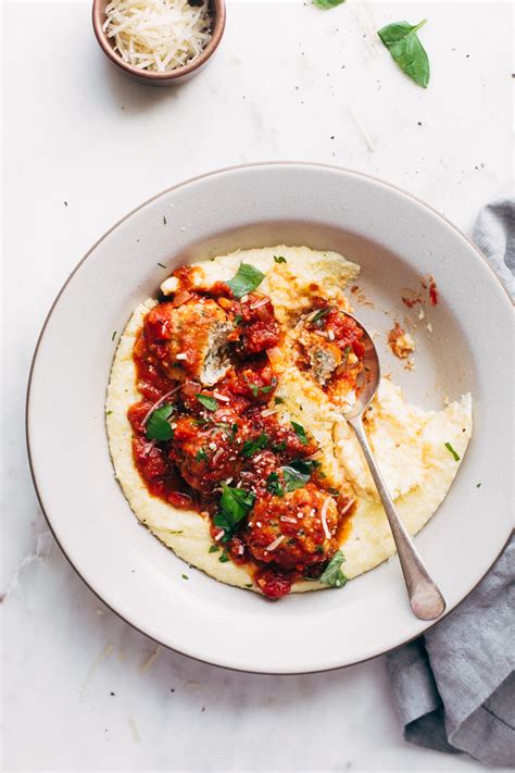 chicken-parmesan-meatballs-with-creamy-polenta image