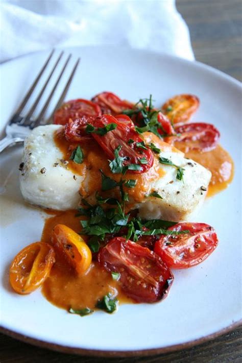 roasted-cod-with-tomato-cream-sauce-recipe-delishcom image