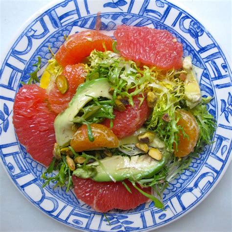 mixed-citrus-and-avocado-on-a-bed-of-frisee image