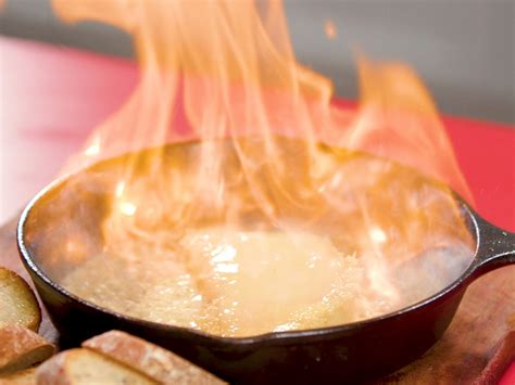 flaming-cheese-saganaki-recipe-myrecipes image