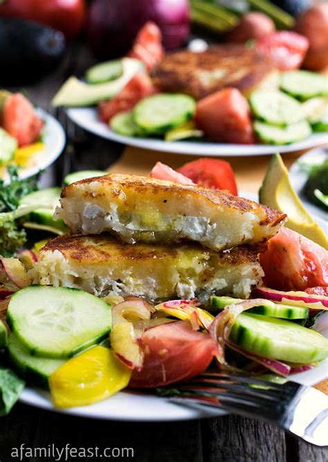 summer-salad-with-goat-cheese-filled-potato-cakes image