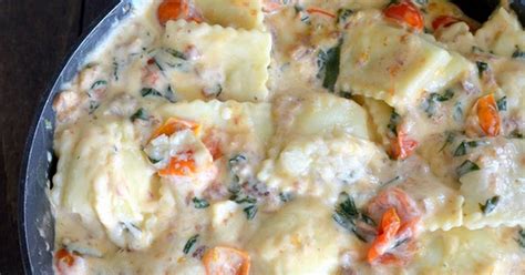 spinach-and-cheese-ravioli-with-alfredo-sauce image