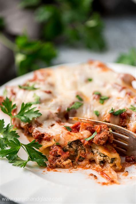 easy-beef-spinach-and-cheese-manicotti-garnish image