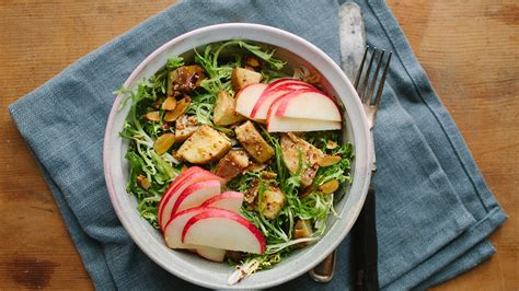 frisee-salad-with-potatoes-apples-and-hazelnuts image