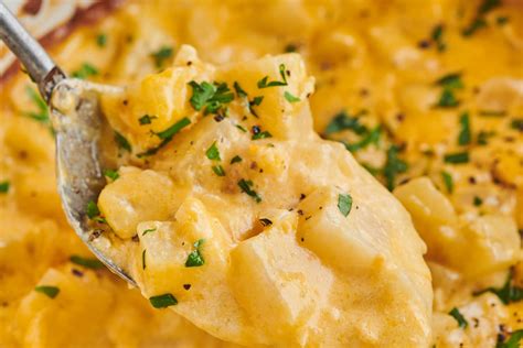 slow-cooker-cheesy-potatoes-recipe-easy-crock-pot image