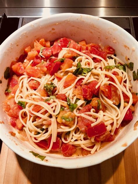 summer-tomato-and-basil-pasta-with-pine-nut-sauce image