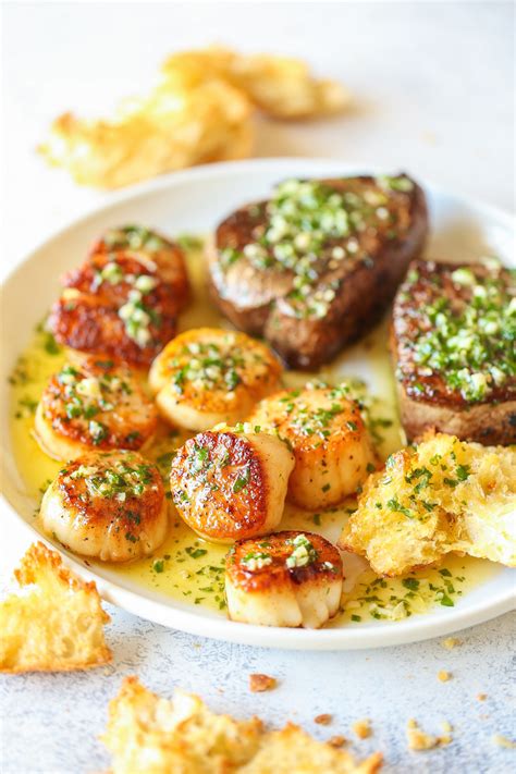 garlic-butter-steak-scallop-recipe-damn-delicious image