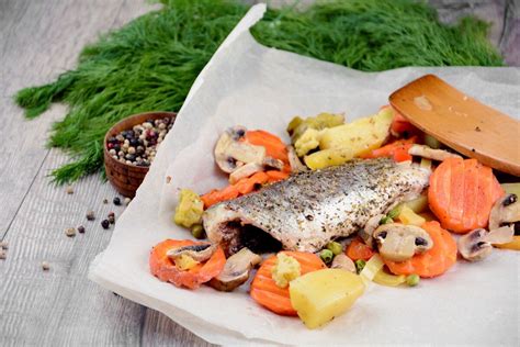 baked-sea-bass-with-vegetables-and-mushrooms-in-the image