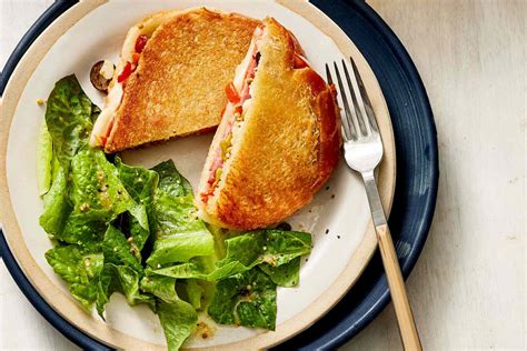 muffaletta-style-grilled-cheese-sandwiches-real-simple image