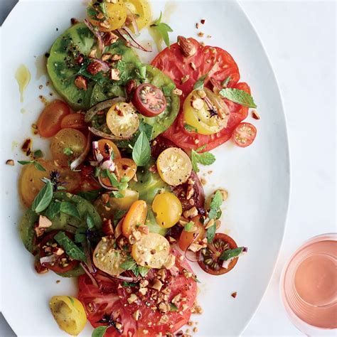tomatoes-with-herbs-and-almond-vinaigrette image