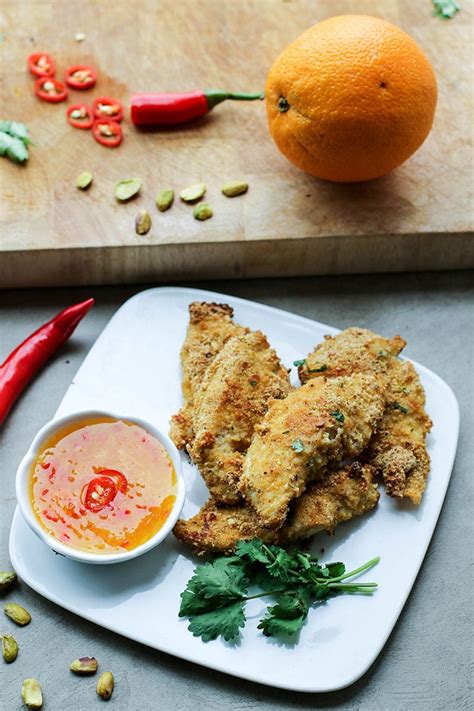 pistachio-crusted-chicken-with-chili-orange-dipping-sauce image