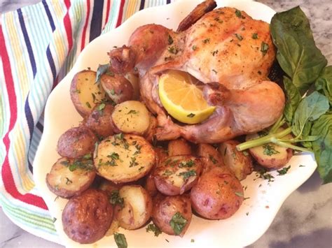 wine-herb-infused-grilled-chicken-and-potatoes image