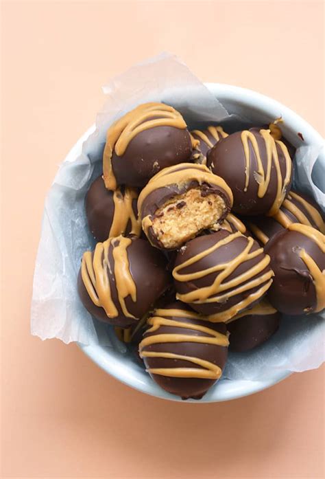 easy-peanut-butter-balls-4-ingredients-sweetest image