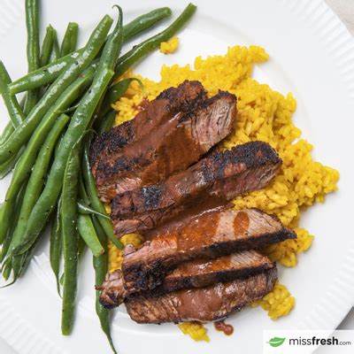 chipotle-steaks-with-turmeric-rice-and-green-beans image