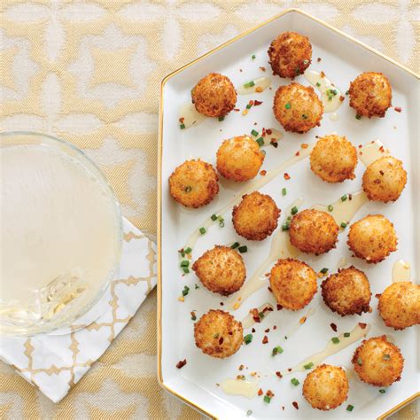 goat-cheese-poppers-with-honey-recipe-myrecipes image