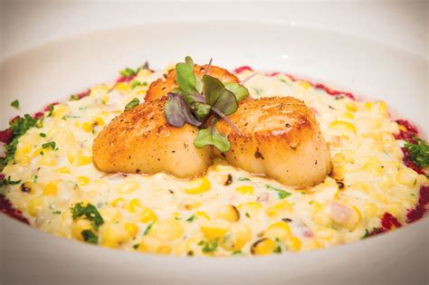 seared-scallops-over-grilled-cream-corn-and-jalapeno image