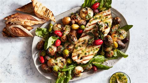 grilled-halibut-steaks-with-potatoes-olives image