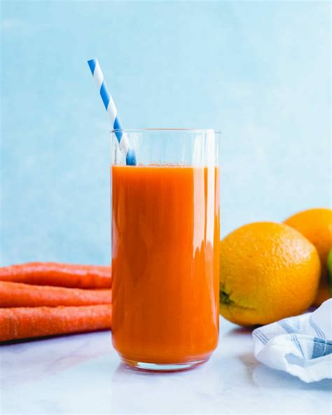 carrot-juice-in-a-blender-a-couple-cooks image