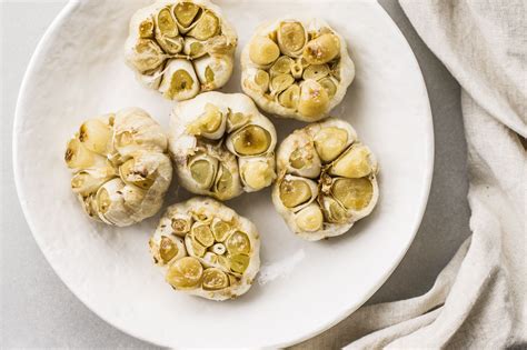 whole-roasted-garlic-recipe-the-spruce-eats image