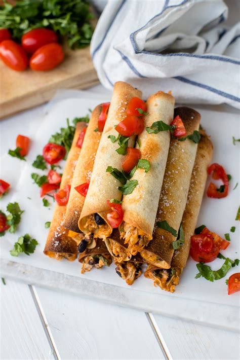 oven-baked-chicken-black-bean-taquitos-nourish-and image