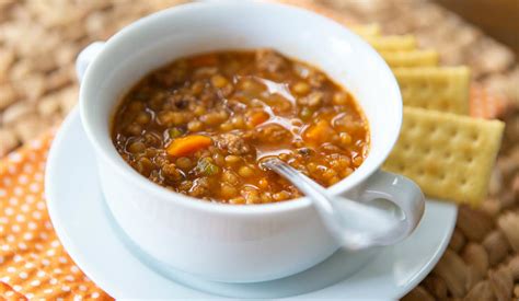 spicy-sausage-and-lentil-soup-peanut-blossom image