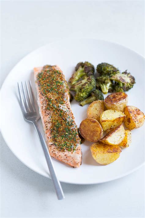 baked-salmon-with-broccoli-potatoes-and-mustard-chive image