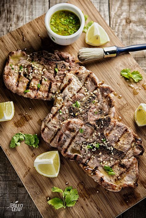 pork-chops-with-lemon-cilantro-vinaigrette-paleo-leap image