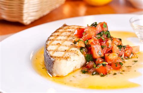 grilled-halibut-steaks-with-tomato-and-red-pepper-salsa image