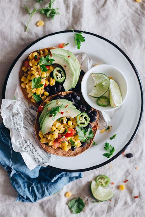 spicy-black-bean-tostadas-with-corn-salsa-and-avocado image