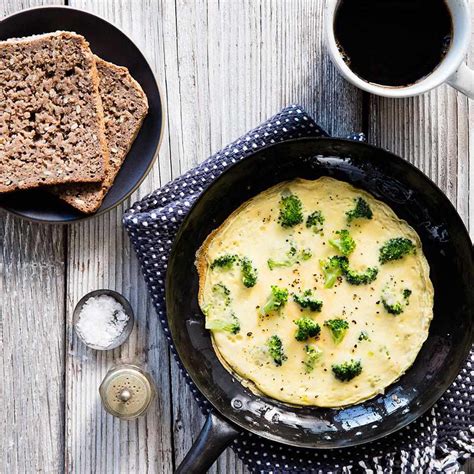 broccoli-parmesan-cheese-omelet-eatingwell image